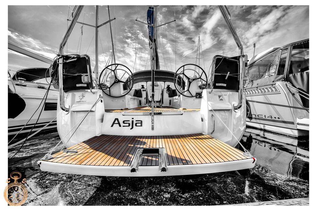 Waves against a fantastic sunsetSailboat in black white against a strong sky, Color Touch Effects
