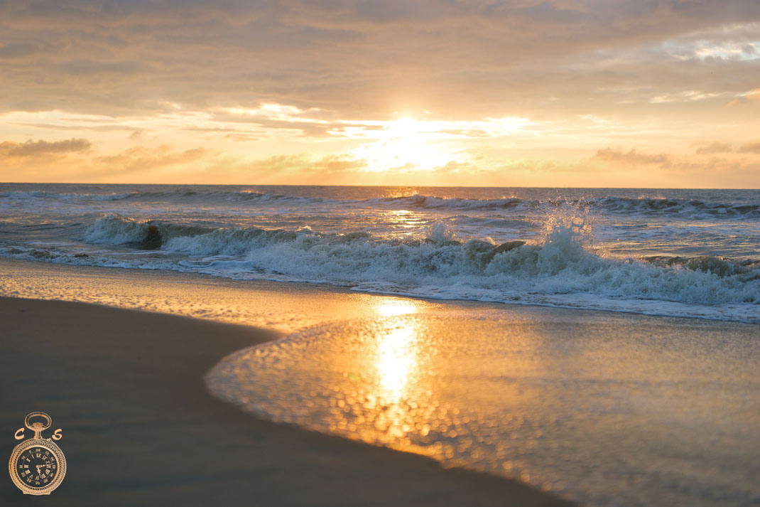 Waves against a fantastic sunset 2