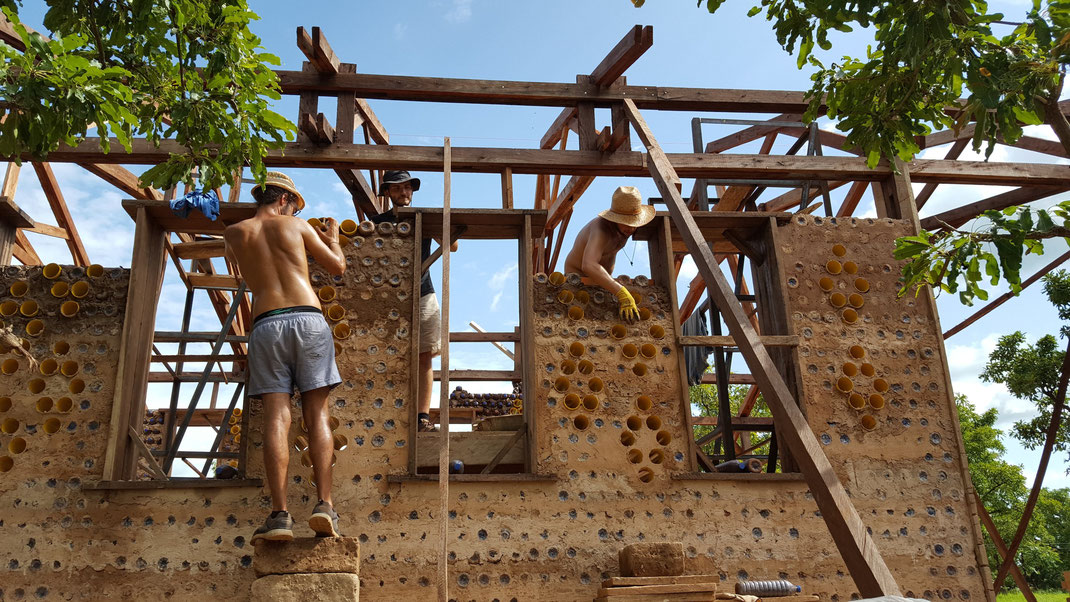 Greek volunteers in Sang, Northern Ghana: bottle-brick construction for a handmade classroom.