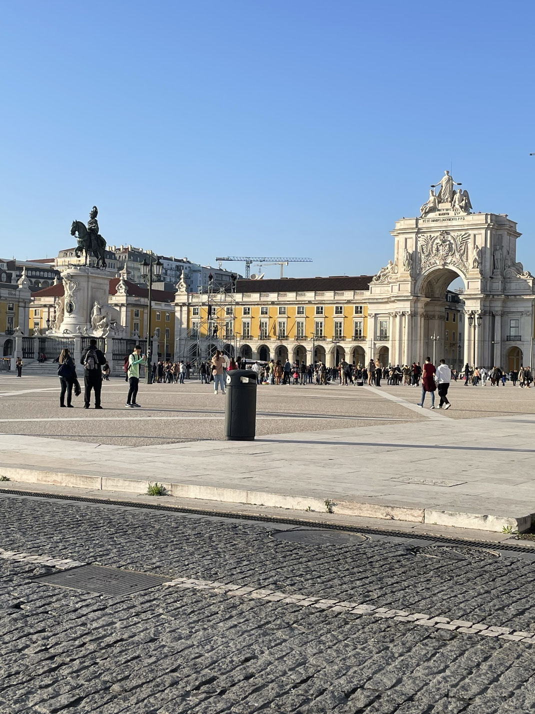 "Take the tram to the bustling waterfront Praça do Comércio"
