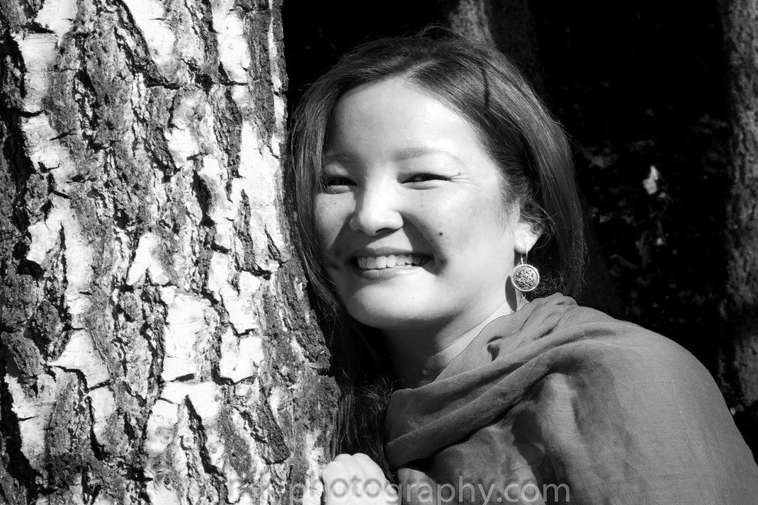 female model on a tree, black-white photo    