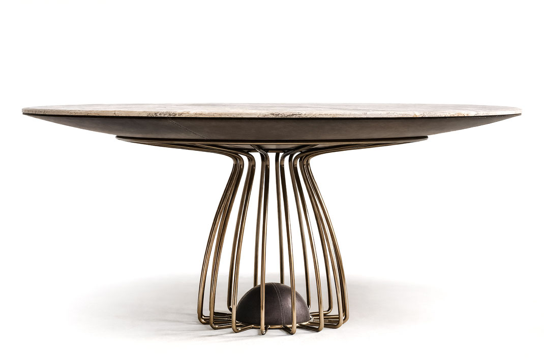Blume dining table designed by Luca Tornaghi for Racconti, featuring marble top and sculptural bronze base.  
