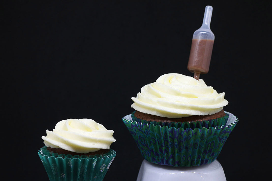 tipsy chocolate cupecakes with white chocolate frosting and homemade chocolate liqueur