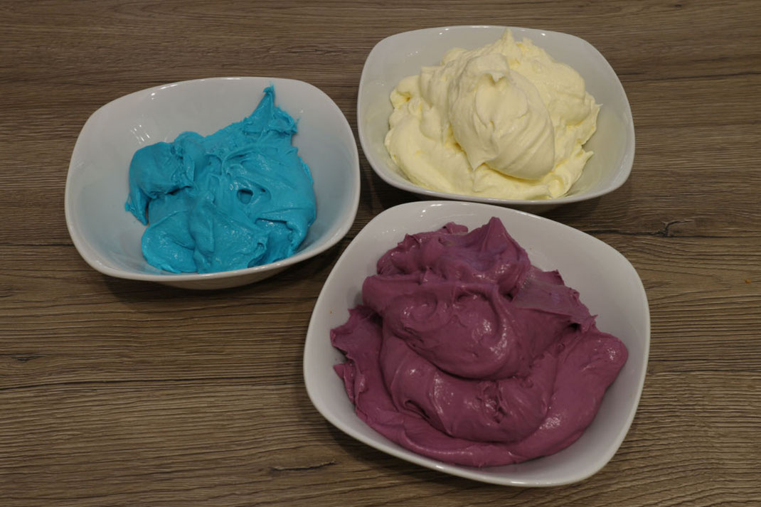 frosting in white, purple and blue