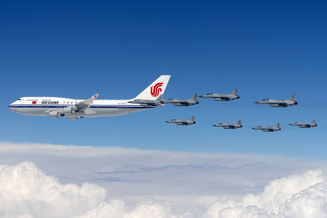 Air China Boeing 747-400 Air Force one escorted by Fighter jets