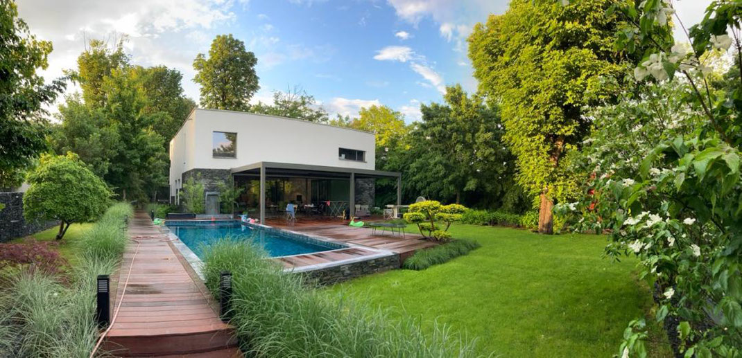 Maison bioclimatique avec ITE et VMC double-flux, maison moderne, maison d'architecte en Seine et Marne, piscine, Varon Architectes