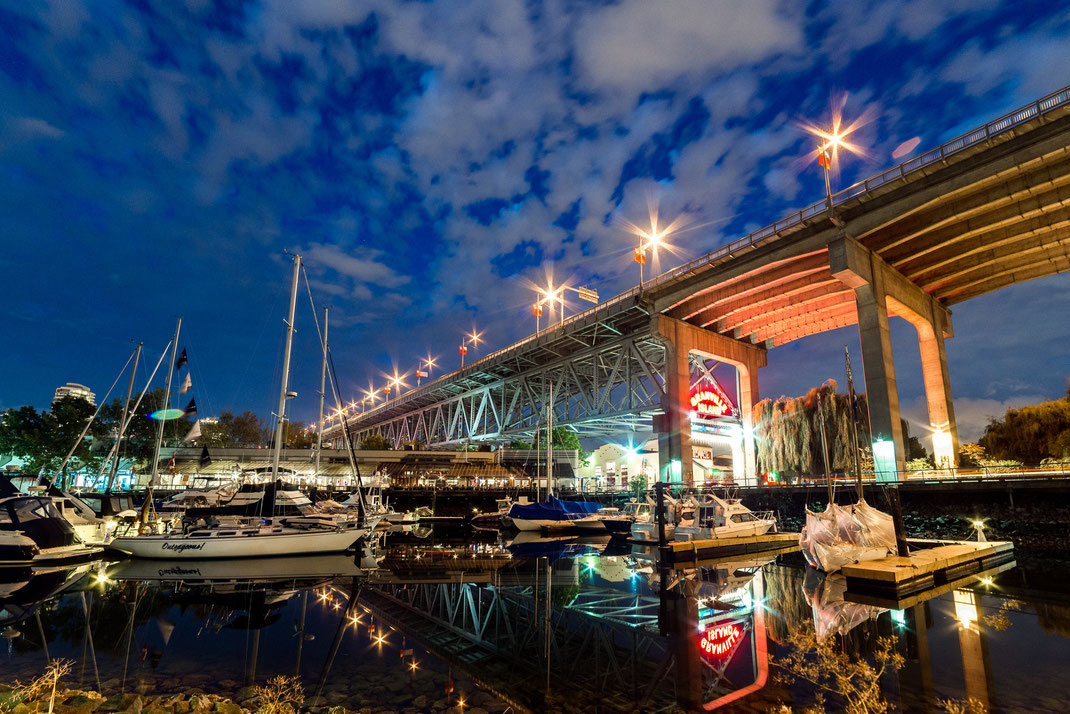 the harbour and entrance to Granville Island at night