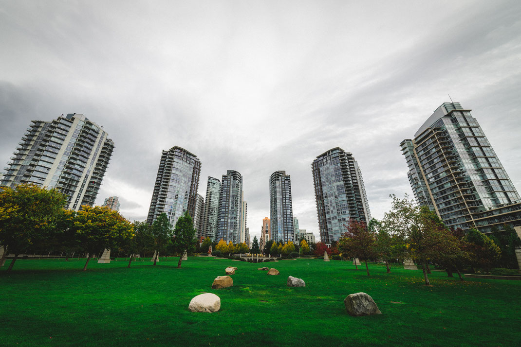 a park surrounded by skyscrapers in Vancouver