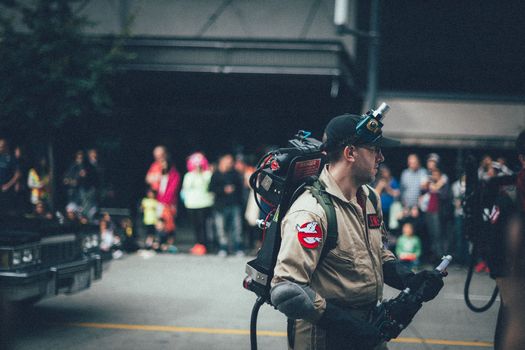 the Ghostbusters walking on the Halloween parade