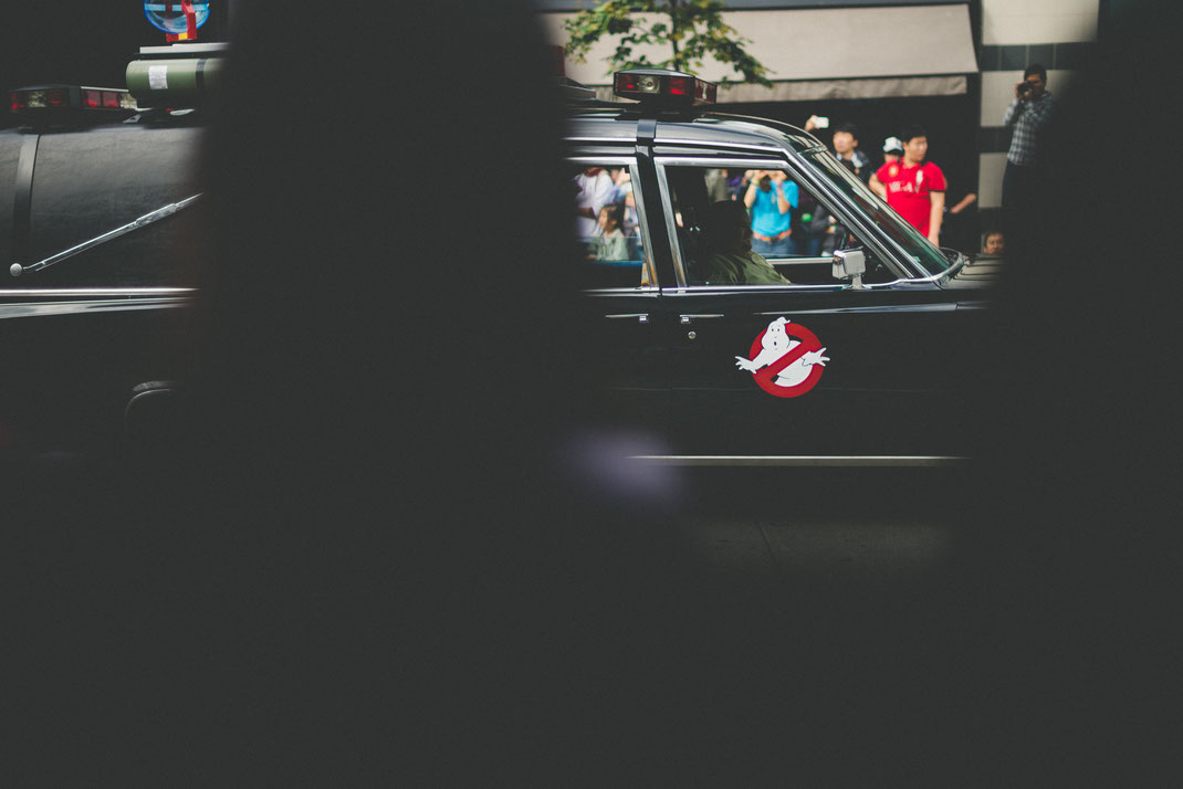 Ecto-1 driving on a Halloween parade