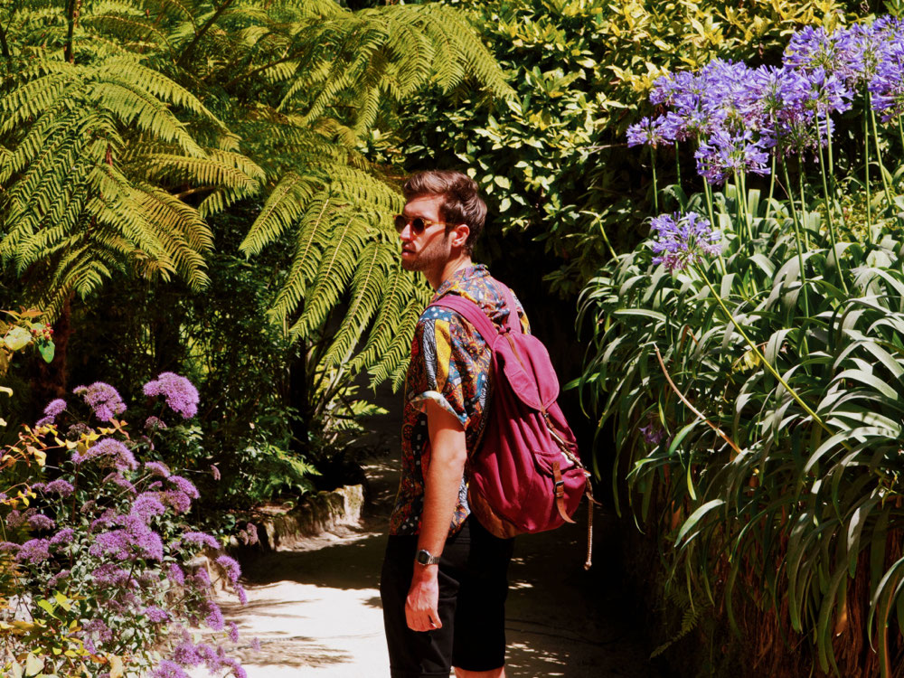 Thomas walking around the gardens