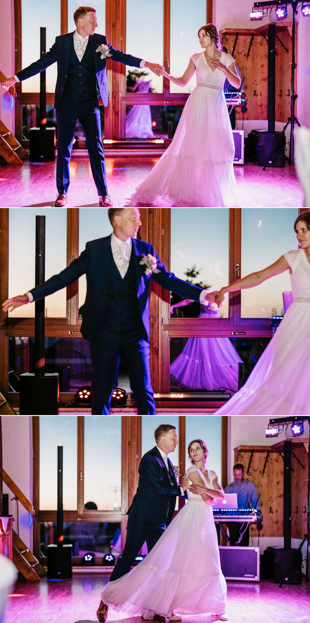 Blaue Stunde Panorama: Hochzeitstanz vor den Panoramafenstern zur Blauen Stunde – Ben Pfeifer Hochzeitsfotograf.