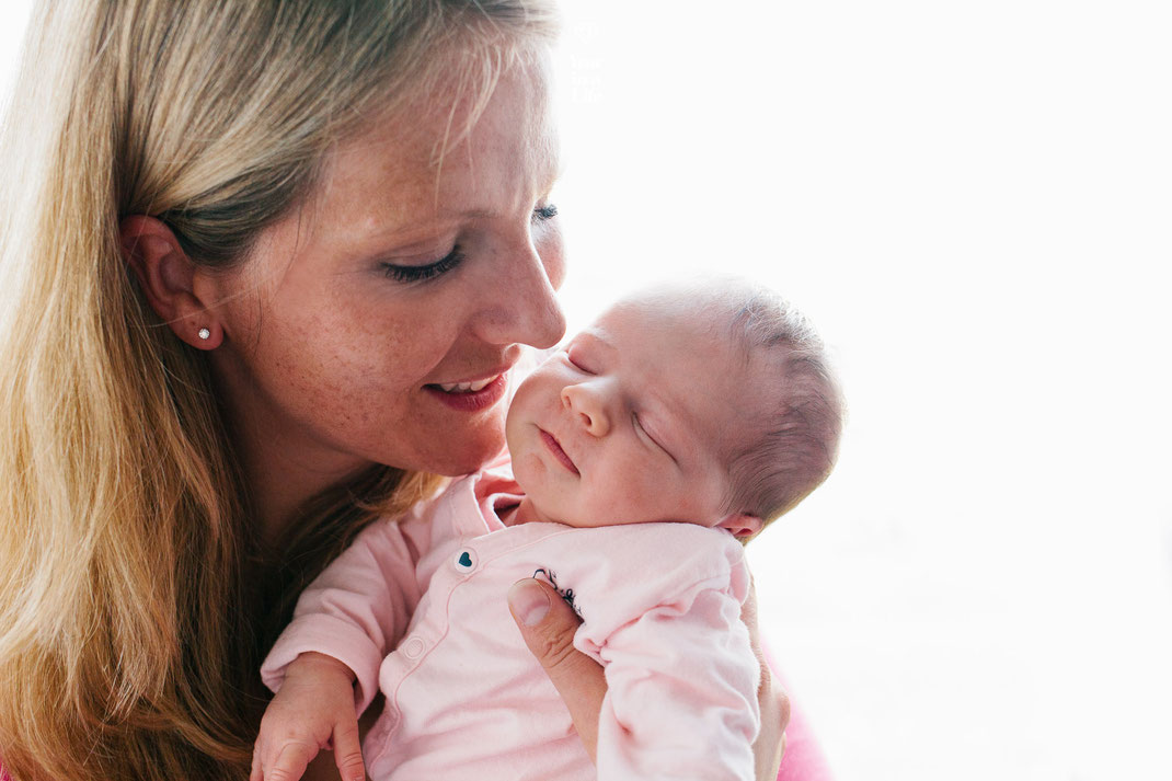 Happy mama with her baby