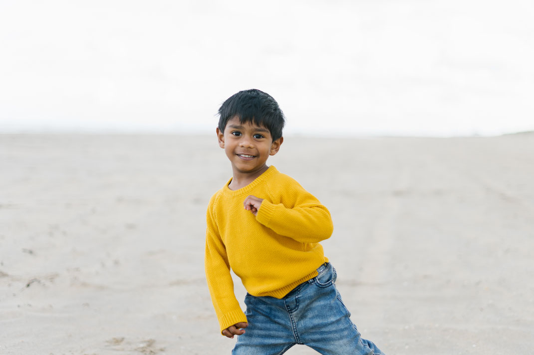 boy on the beach den Haag