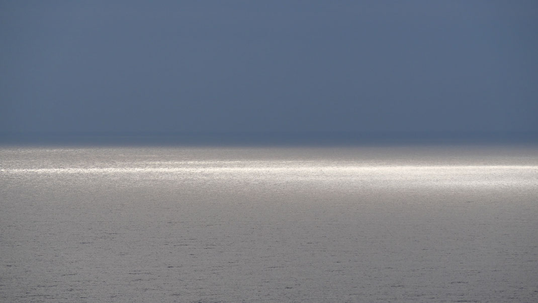 Lichtspiel über dem Meer