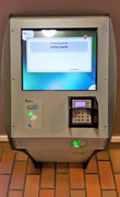 Borne de recharge de la carte de paiement.