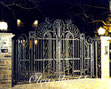 alt="hand forged custom wrought iron driveway gates , scroll work and vertikal lines , arched details, net design on the top.Decorative custom hand made lights.Richmond Hills, Ontario Author Oleg Shyshkin. 