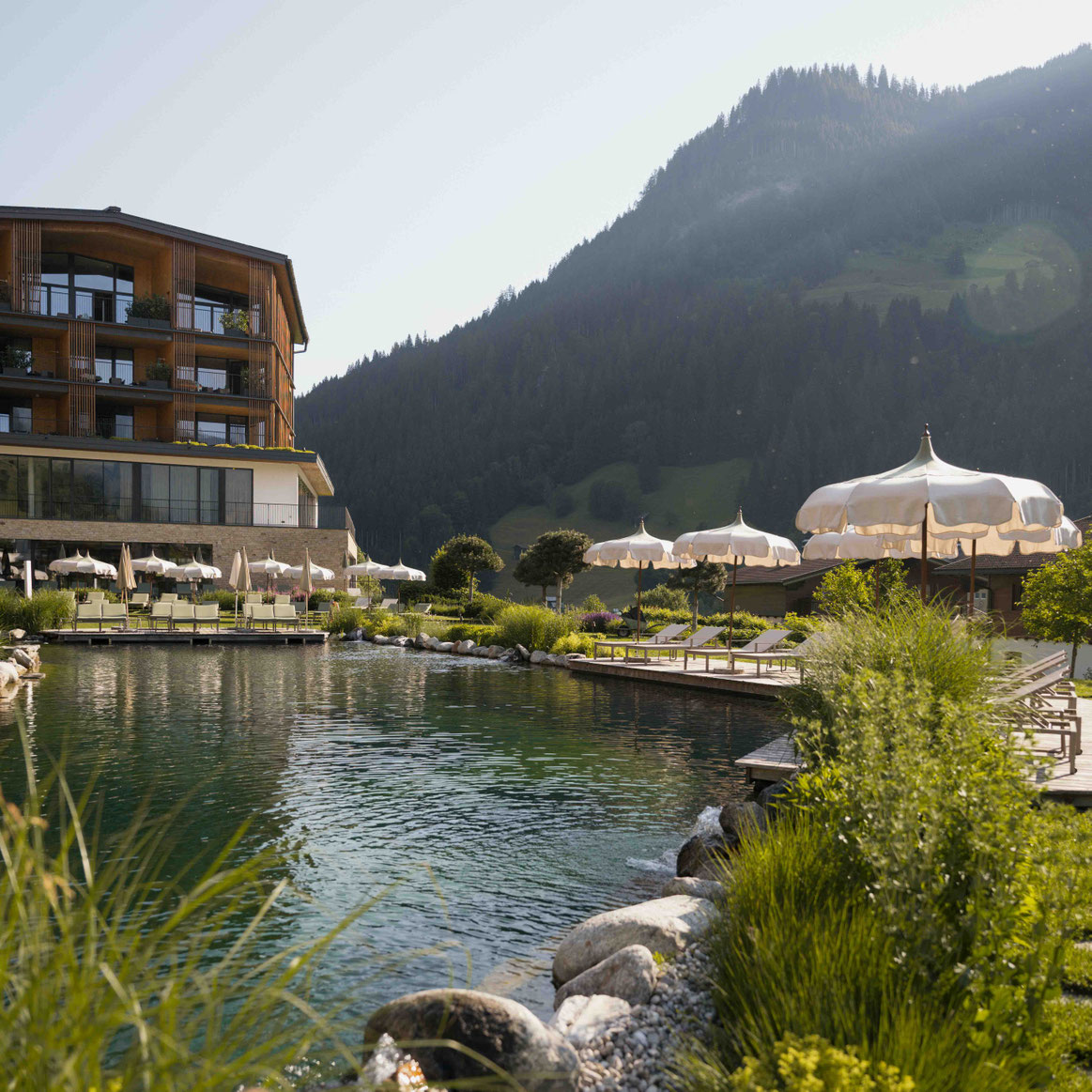 NESSLERHOF in Großarl • 5-Sterne-Wellnesshotel im Salzburger Land - Badeteich _fullwidth-column-splash