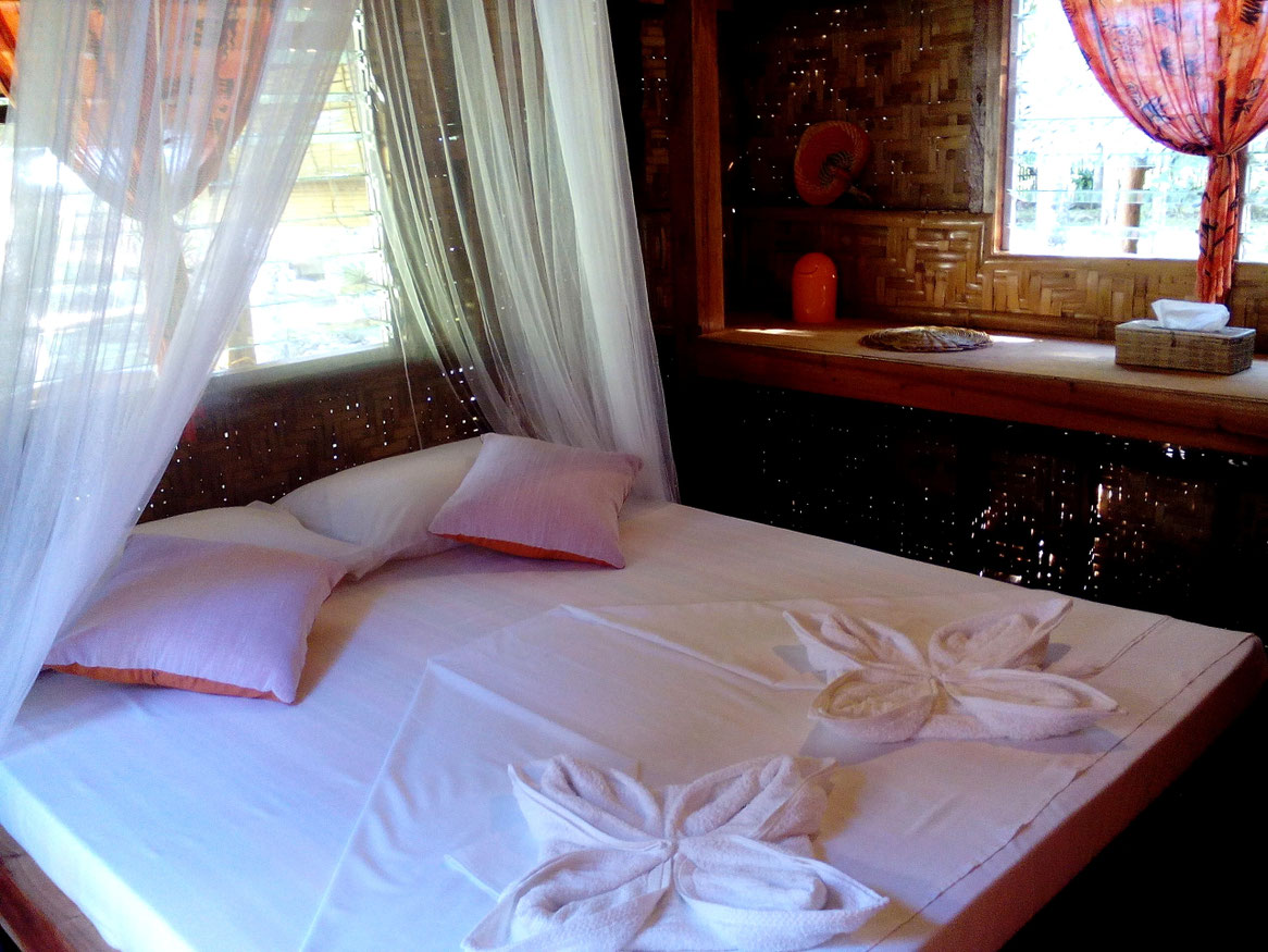 nypa style resort, camiguin, accommodation, holidays, vacation, philippines, rooms, bungalow, orange bungalow, #feelcamiguin
