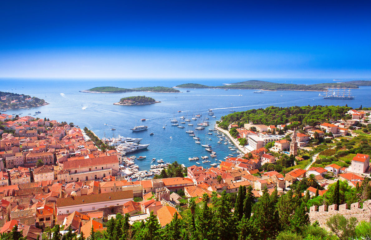 Harbor of old Adriatic island town Hvar. High angle panoramic view. Popular touristic destination of Croatia. Copyright Xenia Chowaniec