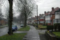 Typical Hall Green semi-detached houses. Photograph Erebus555 -  licensed under Creative Commons Attribution-ShareAlike 3.0 License. See Acknowledgements for a direct link to Wikipedia.