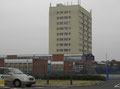 Tamar Drive, one of the two remaining tower blocks and Chivenor School