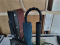 Die Kabel werden mit einem Spiralschlauch umwickelt.