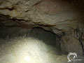 The main room of the cave has 7 small chambers and several big rocks in the centre. 