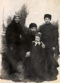 Киликия Степановна и Петр Поликарпович Михайловы с сыном Иваном и дочерью в сибирской ссылке (октябрь 1951 г.)