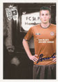 Dennis Daube; Saison: 2010/11 (1. Bundesiga); Trikowerbung: Ein Platz an der Sonne