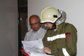 Gruppenkommandant OV Ing. Martin Peer beim gemeldeten Brandmeldealarm, Station 3