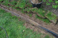 - ausgraben der alten Wasserleitungen, neu verlegen, einschlämmen und die Grasnarbe wieder einsetzten - fertig.