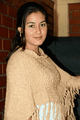 Poncho beige punto pavo real