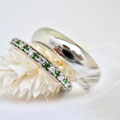 Damenring Memoirering aus Weißgold mit Brillant und Tsavolith und Herrenring aus Platin