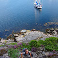 Scrambling up the rocks for a better view