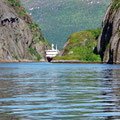 Twice a day, the passengership of Hurtigruten sneaks inside the fjord...