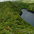 Green and black crater lakes