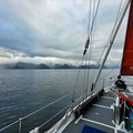 Bye bye Værøy - with little wind but strong currents (in the Maelstrom up to 7kn with tidal overfalls - we give this notorious area a wide berth) we are heading north at midnight.