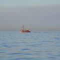 Passing a fishing trawler.