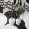 PC021 bronce y corazón blanco vidrio