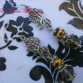 PF011 flor metal y cuentas cristal 
