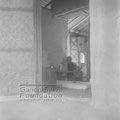 An associate sitting in Gandhi’s hut at Sevagram Ashram, c. November 1946.