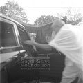 Mahatma Gandhi entering a car, c. April 1947.