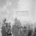 Mahatma Gandhi walking on the campus of Sevagram Ashram (double exposure), c. 1945.