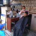 Papa chez le coiffeur vietnamnien