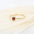 "Granate" - feiner Goldring 750 mit Granat, 780.-
