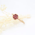 "Pomegranate" - feiner Ring in Roségold 750 mit 7 Rubinen, 740.-