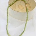 Collier mit Peridot, Verschluss und Zwischenteile Gelbgold 750, 425.-