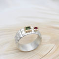 VERKAUFT breiter Silberring 925 mit Spikestruktur und in Gold 750 gefasstem Saphir und Rubin