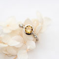 "Kandis" - Sandgoldring 750 mit Citrin und 2 Brillanten à 0.03ct, 1659.-